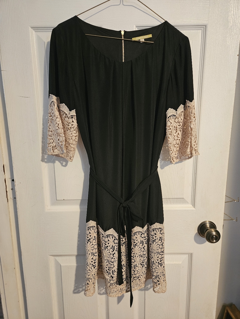 Woman's black dress with cream colored lace accents size S